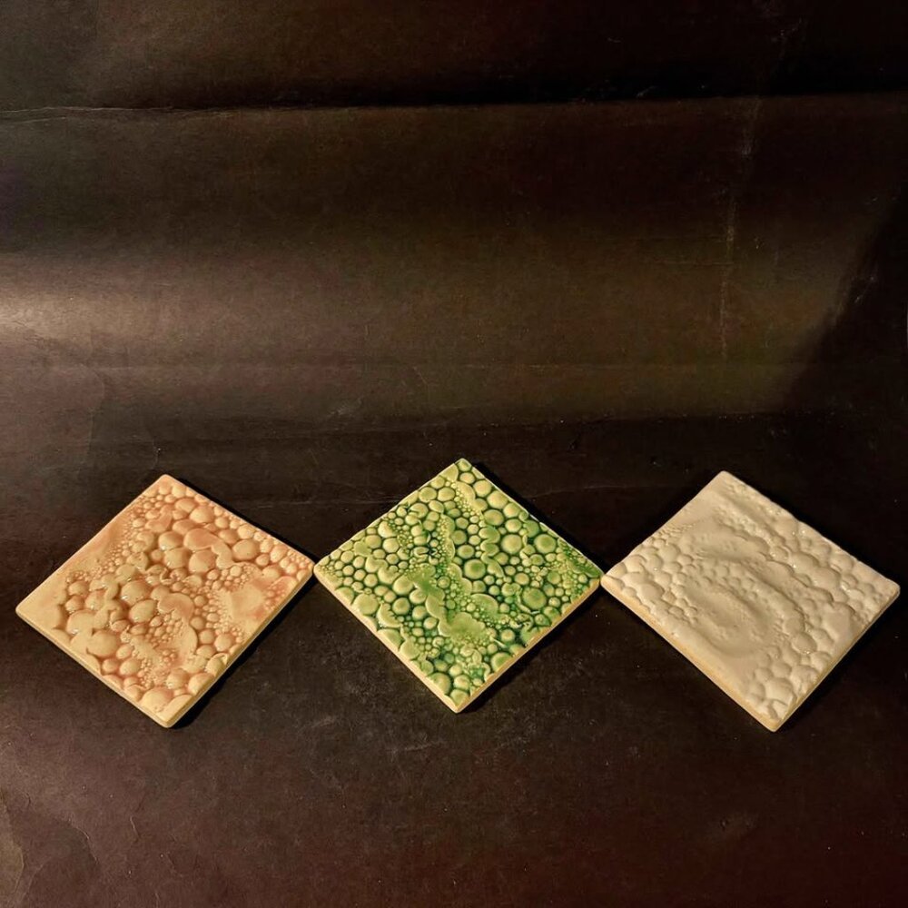Ceramic Tiles Featuring Special Effect Glazes, Specifically "Lava" And "Lichen"